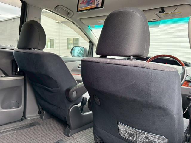 エスティマ ２．４アエラス　Ｇエディション　禁煙車・アルパインフリップダウンモニター・ナビ・Ｂｌｕｅｔｏｏｔｈ対応・ＤＶＤ再生・ＴＶ・Ｂカメラ・ＨＩＤ・ビルトインＥＴＣ・ウッドコンビハンドル・両側電動スライドドア・スペアキー有（27枚目）