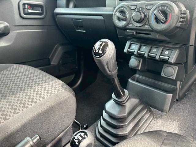 ジムニー XG 禁煙車・セーフティサポート・ワンオーナー・アイドリングストップ・キーレスキー・マニュアルエアコン・背面タイヤ・スペアキー有(22枚目)