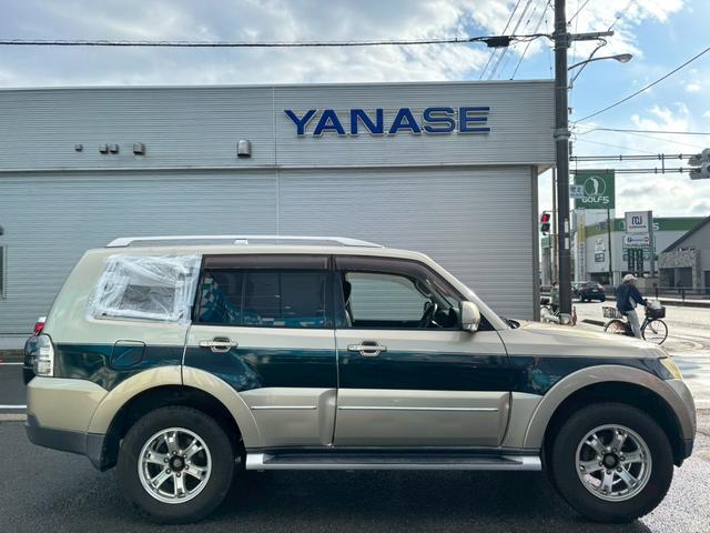 パジェロ ロング　エクシード　車検整備付・過去記録簿付・禁煙車・ロックフォードスピーカー・メーカーナビ・Ｂカメラ・フリップダウンモニター・ツートンカラー・ルーフレール・フロントフォグ・ＨＩＤ（11枚目）