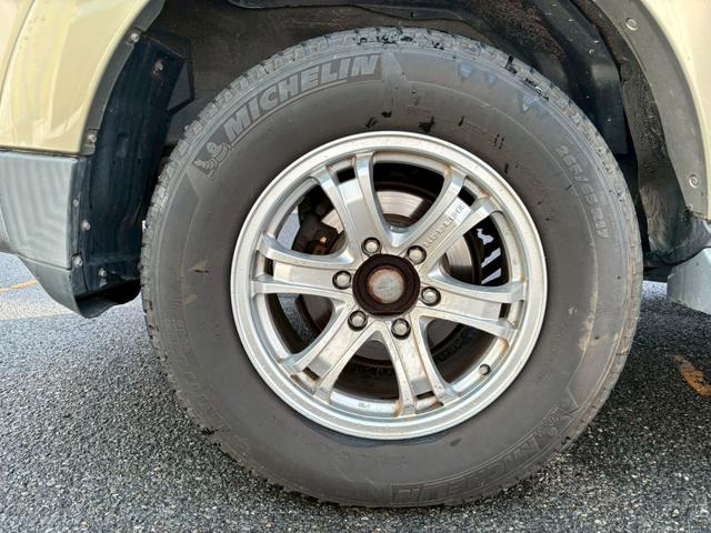 パジェロ ロング　エクシード　車検整備付・過去記録簿付・禁煙車・ロックフォードスピーカー・メーカーナビ・Ｂカメラ・フリップダウンモニター・ツートンカラー・ルーフレール・フロントフォグ・ＨＩＤ（52枚目）