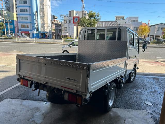 アトラストラック Ｗキャブスーパーロー　ナビ　ＤＴＶ　ＥＴＣ　ドライブレコーダー　メッキコーナーパネル　メッキミラーカバー　メッキグリル　アイドリングストップ機能　左右電動格納ミラー　キーレス　オートマ車（6枚目）