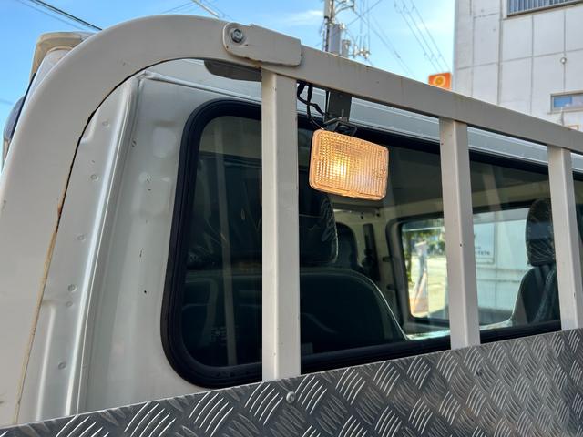 アトラストラック Ｗキャブスーパーロー　ナビ　ＤＴＶ　ＥＴＣ　ドライブレコーダー　メッキコーナーパネル　メッキミラーカバー　メッキグリル　アイドリングストップ機能　左右電動格納ミラー　キーレス　オートマ車（27枚目）