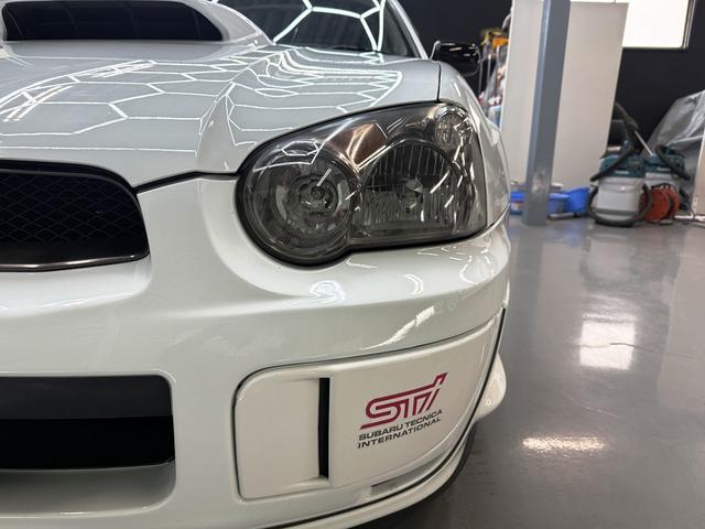 インプレッサ ＷＲＸ　ＳＴｉ　涙目最終モデル　アプライドＥ型　６速ＭＴ　禁煙車　ＳＴｉダウンサス　外メモリーナビ　フルセグＴＶ　ＢＴ　ＥＴＣ　ＨＩＤヘッド　ルーフスポイラー　Ｒスポイラー　タイミングベルト交換済（9枚目）