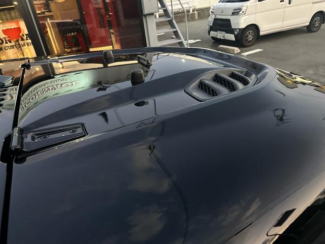 ジープ・ラングラーアンリミテッド スポーツ　ナビ・ＥＴＣ・バックカメラ・フロントカメラ・サイドカメラ・２４グリルフェイス・ＬＥＤヘッドライト・３５インチＴＡ・１７インチＡＷ・前後スチールバンパー・ルーフラック・ヒンジステップ・オーバーフェンダー（40枚目）