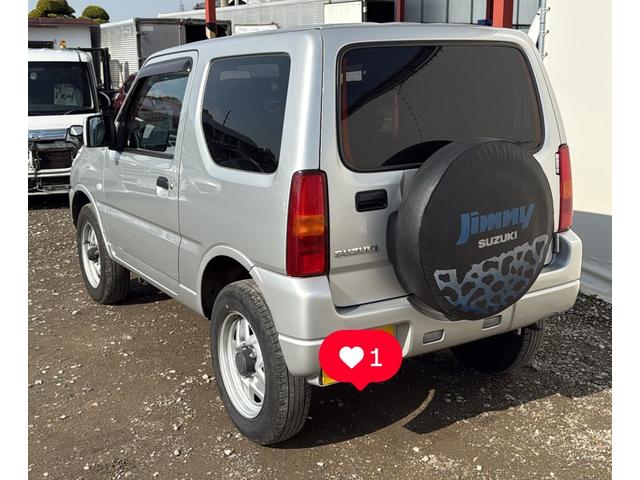 ジムニー １２ヶ月保証付　ＸＧ　ターボ　５速ＭＴ　キーレス　４ＷＤ　社外ＣＤオーディオ　ヘッドライトレベライザー　純正１６インチＡＷ（3枚目）