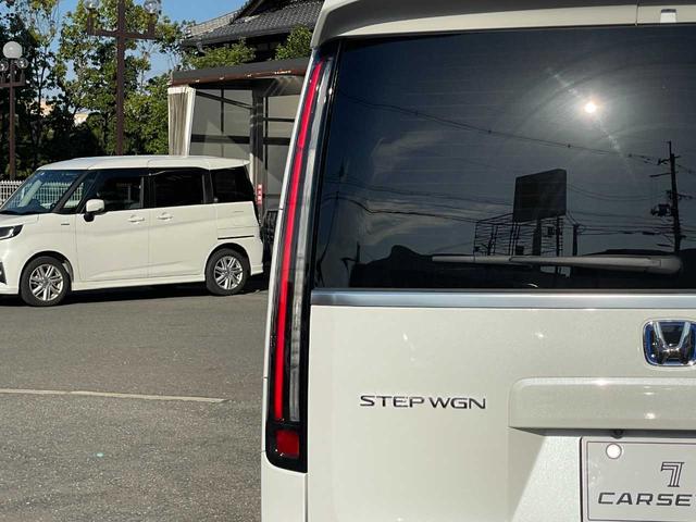 ステップワゴン ｅ：ＨＥＶスパーダ　プレミアムライン　ホンダセンシング　１１．４インチ純正ナビ　１５．６インチフリップダウン　フルセグＴＶ　マルチビューカメラ　ブラインドスポット　パワーテールゲート　シートヒーター　２列目オットマン　純正１７インチＡＷ（65枚目）
