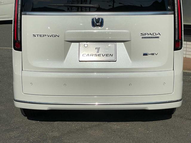 ステップワゴン ｅ：ＨＥＶスパーダ　プレミアムライン　ホンダセンシング　１１．４インチ純正ナビ　１５．６インチフリップダウン　フルセグＴＶ　マルチビューカメラ　ブラインドスポット　パワーテールゲート　シートヒーター　２列目オットマン　純正１７インチＡＷ（66枚目）
