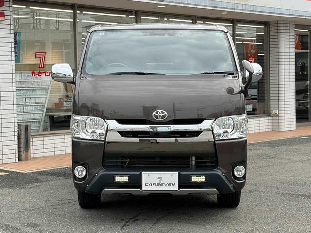 ハイエースバン スーパーGL 50TH アニバーサリーリミテッド 両側パワスラ 寒冷地仕様 TRDフロントスポイラー アルパインフローティングナビ、11.1型デジタルミラー、12.8インチフリップダウン 運転席レカロシート ユーアイビークルベッドキット(2枚目)