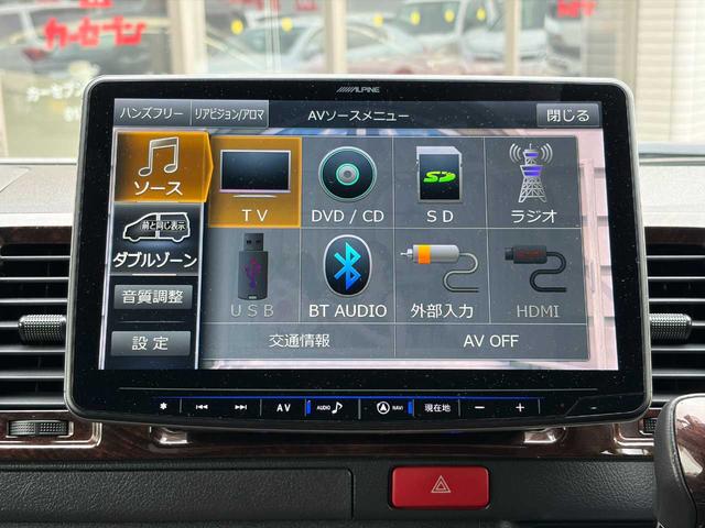 ハイエースバン スーパーGL 50TH アニバーサリーリミテッド 両側パワスラ 寒冷地仕様 TRDフロントスポイラー アルパインフローティングナビ、11.1型デジタルミラー、12.8インチフリップダウン 運転席レカロシート ユーアイビークルベッドキット(31枚目)