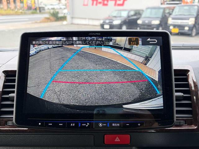 ハイエースバン スーパーGL 50TH アニバーサリーリミテッド 両側パワスラ 寒冷地仕様 TRDフロントスポイラー アルパインフローティングナビ、11.1型デジタルミラー、12.8インチフリップダウン 運転席レカロシート ユーアイビークルベッドキット(32枚目)