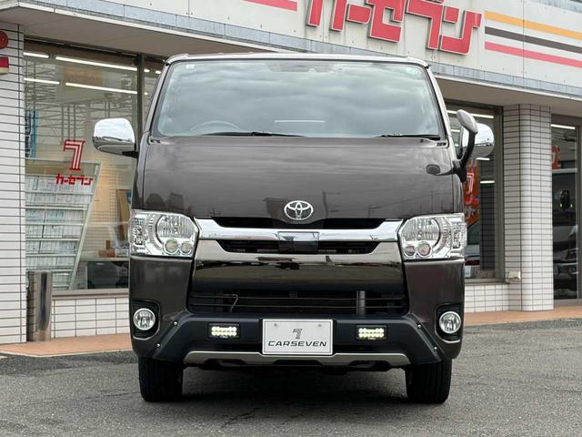 ハイエースバン スーパーGL 50TH アニバーサリーリミテッド 両側パワスラ 寒冷地仕様 TRDフロントスポイラー アルパインフローティングナビ、11.1型デジタルミラー、12.8インチフリップダウン 運転席レカロシート ユーアイビークルベッドキット(49枚目)