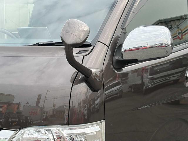 ハイエースバン スーパーGL 50TH アニバーサリーリミテッド 両側パワスラ 寒冷地仕様 TRDフロントスポイラー アルパインフローティングナビ、11.1型デジタルミラー、12.8インチフリップダウン 運転席レカロシート ユーアイビークルベッドキット(59枚目)