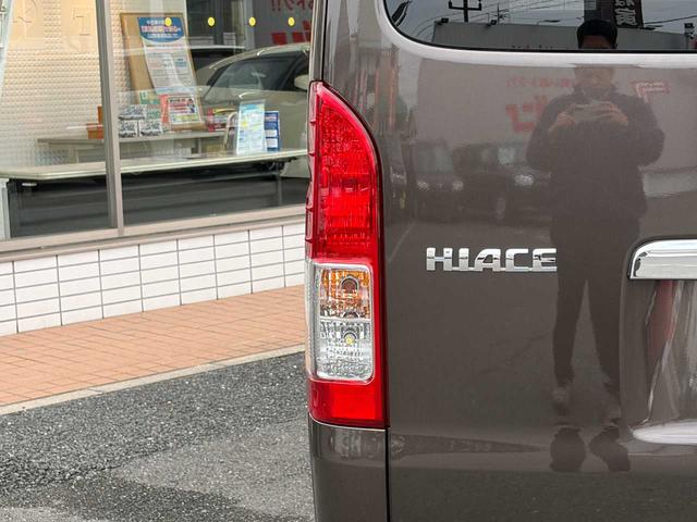 ハイエースバン スーパーGL 50TH アニバーサリーリミテッド 両側パワスラ 寒冷地仕様 TRDフロントスポイラー アルパインフローティングナビ、11.1型デジタルミラー、12.8インチフリップダウン 運転席レカロシート ユーアイビークルベッドキット(63枚目)