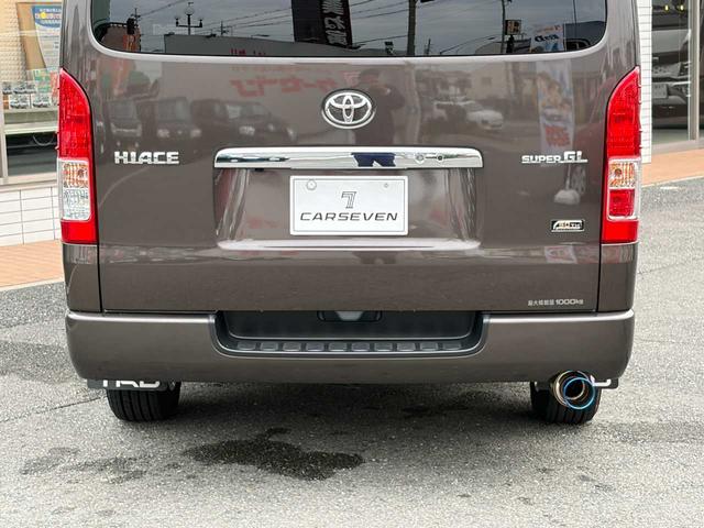 ハイエースバン スーパーGL 50TH アニバーサリーリミテッド 両側パワスラ 寒冷地仕様 TRDフロントスポイラー アルパインフローティングナビ、11.1型デジタルミラー、12.8インチフリップダウン 運転席レカロシート ユーアイビークルベッドキット(64枚目)