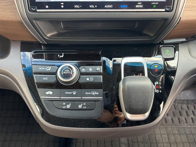 フリードハイブリッド ハイブリッド・Gホンダセンシング 衝突軽減B 純正9インチナビ Bluetooth対応 Bカメラ ビルドインETC 両側自動ドア アダプティブクルーズコントロール LEDヘッドライト スマートキー プッシュスタート 電動格納ミラー(10枚目)