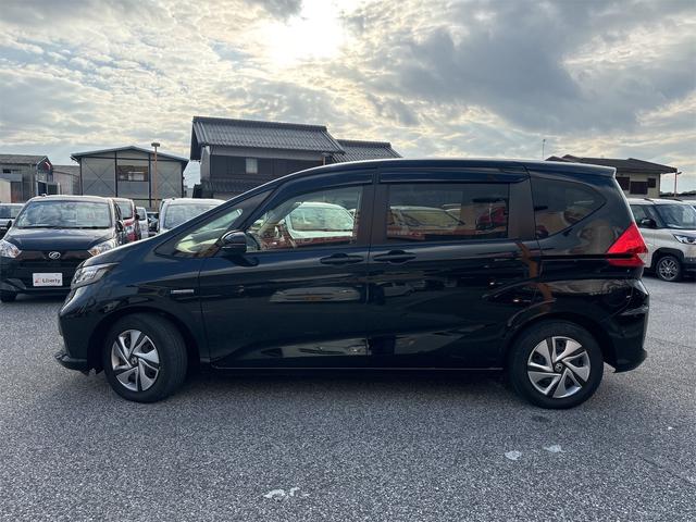 フリードハイブリッド ハイブリッド・Gホンダセンシング 衝突軽減B 純正9インチナビ Bluetooth対応 Bカメラ ビルドインETC 両側自動ドア アダプティブクルーズコントロール LEDヘッドライト スマートキー プッシュスタート 電動格納ミラー(18枚目)