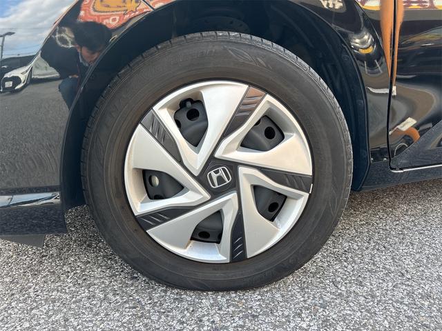 フリードハイブリッド ハイブリッド・Gホンダセンシング 衝突軽減B 純正9インチナビ Bluetooth対応 Bカメラ ビルドインETC 両側自動ドア アダプティブクルーズコントロール LEDヘッドライト スマートキー プッシュスタート 電動格納ミラー(25枚目)