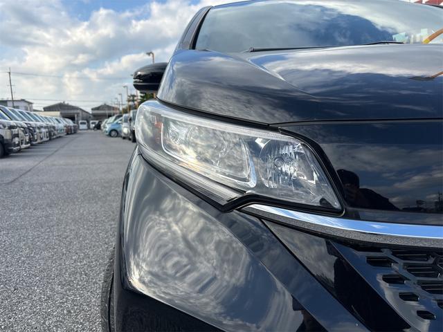 フリードハイブリッド ハイブリッド・Gホンダセンシング 衝突軽減B 純正9インチナビ Bluetooth対応 Bカメラ ビルドインETC 両側自動ドア アダプティブクルーズコントロール LEDヘッドライト スマートキー プッシュスタート 電動格納ミラー(27枚目)