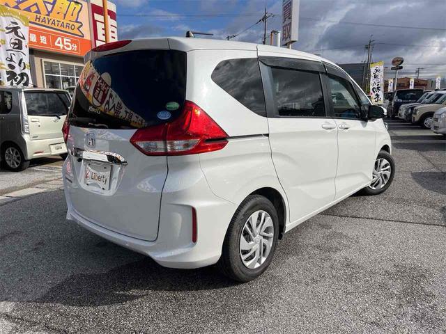 フリード Ｇ・ホンダセンシング　バックカメラ　クリアランスソナー　オートクルーズコントロール　レーンアシスト　衝突被害軽減システム　両側電動スライドドア　オートライト　スマートキー　アイドリングストップ　電動格納ミラー　３列シート（11枚目）
