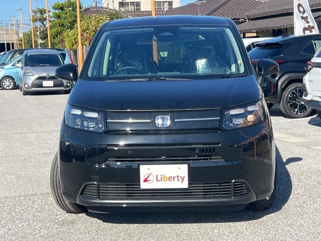 フリード ｅ：ＨＥＶエアー　ＥＸ　ＨｏｎｄａＳＥＮＳＩＮＧ　両側電動スライドドア　クリアランスソナー　アダプティブクルーズコントロール　レーンアシスト　衝突被害軽減システム　ＬＥＤヘッドランプ　電動パーキングブレーキ　シートヒーター（6枚目）