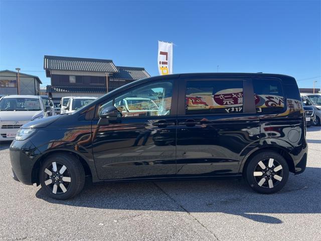 フリード ｅ：ＨＥＶエアー　ＥＸ　ＨｏｎｄａＳＥＮＳＩＮＧ　両側電動スライドドア　クリアランスソナー　アダプティブクルーズコントロール　レーンアシスト　衝突被害軽減システム　ＬＥＤヘッドランプ　電動パーキングブレーキ　シートヒーター（9枚目）