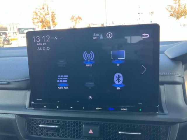 ステップワゴン ｅＨＥＶスパーダ　新品タイヤ／保証書／純正　１１インチ　ＳＤナビ／フリップダウンモニター　純正　１２．８インチ／衝突安全装置／両側電動スライドドア／シートヒーター／車線逸脱防止支援システム／シート　合皮　バックカメラ（11枚目）