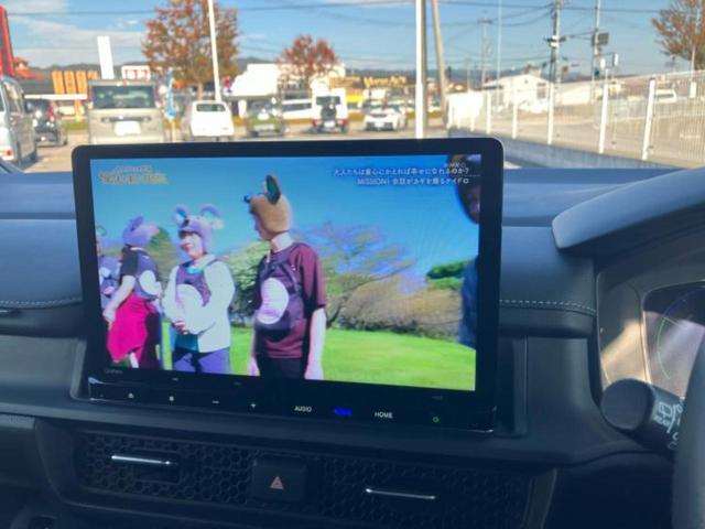 ステップワゴン ｅＨＥＶスパーダ　新品タイヤ／保証書／純正　１１インチ　ＳＤナビ／フリップダウンモニター　純正　１２．８インチ／衝突安全装置／両側電動スライドドア／シートヒーター／車線逸脱防止支援システム／シート　合皮　バックカメラ（12枚目）