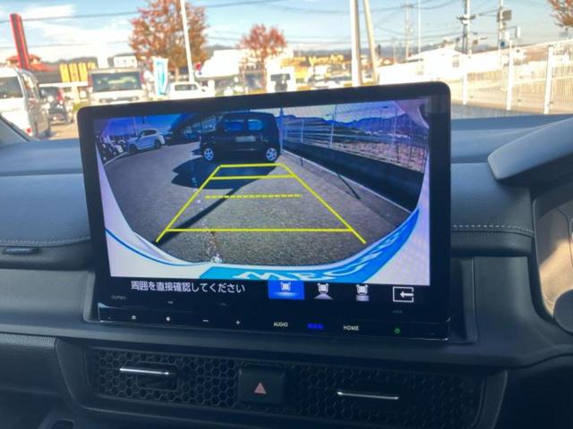 ステップワゴン ｅＨＥＶスパーダ　新品タイヤ／保証書／純正　１１インチ　ＳＤナビ／フリップダウンモニター　純正　１２．８インチ／衝突安全装置／両側電動スライドドア／シートヒーター／車線逸脱防止支援システム／シート　合皮　バックカメラ（13枚目）