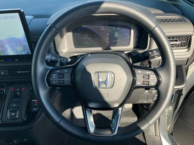 ステップワゴン ｅＨＥＶスパーダ　新品タイヤ／保証書／純正　１１インチ　ＳＤナビ／フリップダウンモニター　純正　１２．８インチ／衝突安全装置／両側電動スライドドア／シートヒーター／車線逸脱防止支援システム／シート　合皮　バックカメラ（15枚目）