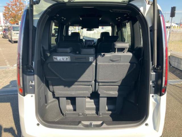 ステップワゴン ｅＨＥＶスパーダ　新品タイヤ／保証書／純正　１１インチ　ＳＤナビ／フリップダウンモニター　純正　１２．８インチ／衝突安全装置／両側電動スライドドア／シートヒーター／車線逸脱防止支援システム／シート　合皮　バックカメラ（20枚目）