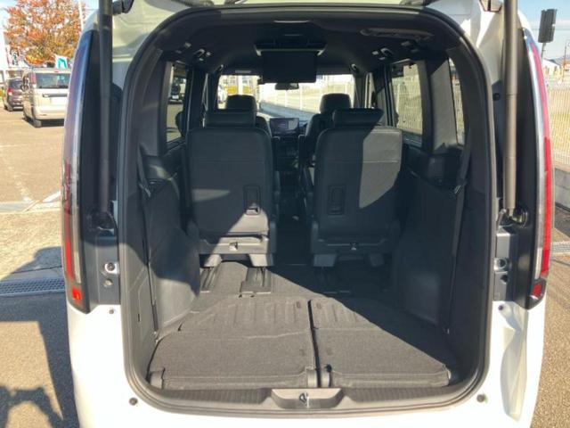 ステップワゴン ｅＨＥＶスパーダ　新品タイヤ／保証書／純正　１１インチ　ＳＤナビ／フリップダウンモニター　純正　１２．８インチ／衝突安全装置／両側電動スライドドア／シートヒーター／車線逸脱防止支援システム／シート　合皮　バックカメラ（21枚目）