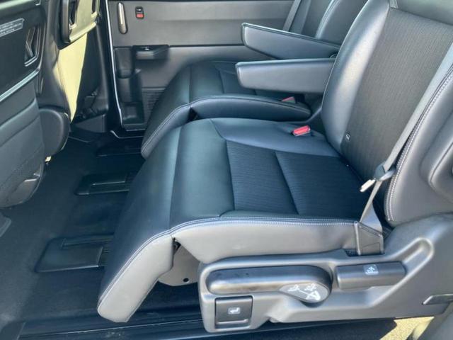 ステップワゴン ｅＨＥＶスパーダ　新品タイヤ／保証書／純正　１１インチ　ＳＤナビ／フリップダウンモニター　純正　１２．８インチ／衝突安全装置／両側電動スライドドア／シートヒーター／車線逸脱防止支援システム／シート　合皮　バックカメラ（26枚目）