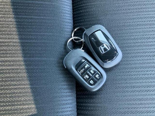 ステップワゴン ｅＨＥＶスパーダ　新品タイヤ／保証書／純正　１１インチ　ＳＤナビ／フリップダウンモニター　純正　１２．８インチ／衝突安全装置／両側電動スライドドア／シートヒーター／車線逸脱防止支援システム／シート　合皮　バックカメラ（37枚目）