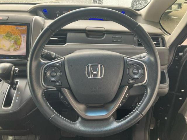 フリード Ｇホンダセンシング　新品タイヤ／保証書／純正　９インチ　メモリーナビ／衝突安全装置／両側電動スライドドア／車線逸脱防止支援システム／シート　ハーフレザー／Ｂｌｕｅｔｏｏｔｈ接続／ＥＴＣ／ＥＢＤ付ＡＢＳ／横滑り防止装置（13枚目）