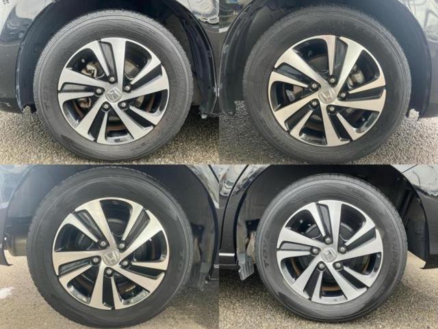 フリード Ｇホンダセンシング　新品タイヤ／保証書／純正　９インチ　メモリーナビ／衝突安全装置／両側電動スライドドア／車線逸脱防止支援システム／シート　ハーフレザー／Ｂｌｕｅｔｏｏｔｈ接続／ＥＴＣ／ＥＢＤ付ＡＢＳ／横滑り防止装置（52枚目）