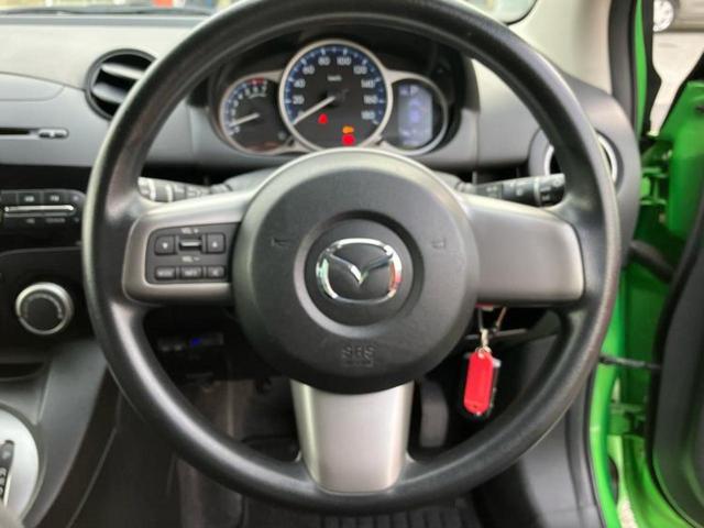 デミオ １３－スカイアクティブ　保証書／ＥＴＣ／ＥＢＤ付ＡＢＳ／横滑り防止装置／アイドリングストップ／エアバッグ　運転席／エアバッグ　助手席／衝突安全ボディ／アルミホイール　純正　１４インチ／パワーウインドウ／キーレスエントリー（12枚目）