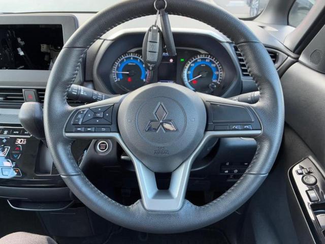 デリカミニ Ｇ　保証書／イーアシスト（ミツビシ）／電動スライドドア／シートヒーター　前席／車線逸脱防止支援システム／シート　ハーフレザー／ヘッドランプ　ＬＥＤ／ＥＢＤ付ＡＢＳ／横滑り防止装置／アイドリングストップ（10枚目）