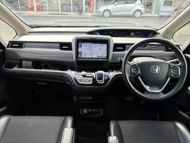 フリードハイブリッド ハイブリッドＧホンダセンシング　保証書／純正　９インチ　ＳＤナビ／衝突安全装置／両側電動スライドドア／シートヒーター　前席／車線逸脱防止支援システム／シート　ハーフレザー／ドライブレコーダー　前後／ヘッドランプ　ＬＥＤ　バックカメラ（26枚目）