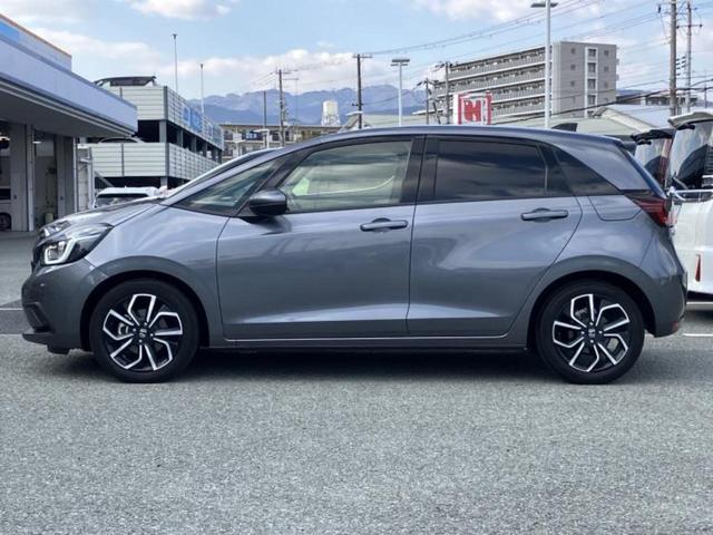 フィット eHEVホーム 新品タイヤ/保証書/純正 9インチ SDナビ/衝突安全装置/車線逸脱防止支援システム/シート ハーフレザー/ドライブレコーダー 前後/ヘッドランプ LED/Bluetooth接続/ETC バックカメラ(2枚目)