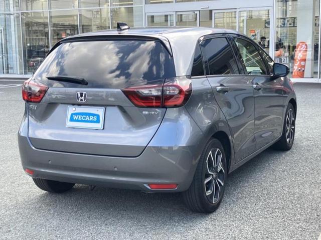 フィット eHEVホーム 新品タイヤ/保証書/純正 9インチ SDナビ/衝突安全装置/車線逸脱防止支援システム/シート ハーフレザー/ドライブレコーダー 前後/ヘッドランプ LED/Bluetooth接続/ETC バックカメラ(3枚目)