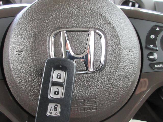 Ｎ－ＢＯＸ Ｌ　純正７型ナビ（ＣＤ・ＤＶＤ・ＳＤ・ＲＥＣ・フルセグ・ＢＴ・ＵＳＢ）Ｂカメラ・ＥＴＣ・Ｐセンサ－　前席シートヒーター・シートバックテーブル・リアサンシェード・電子パーキング・ブレーキホールド（26枚目）
