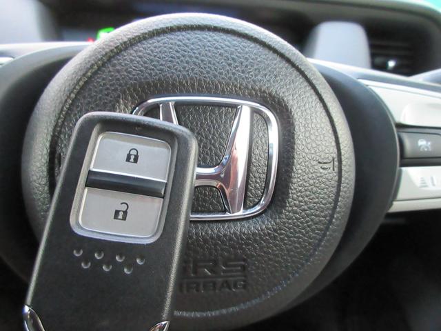 フィット e:HEVホーム 純正Dオーディオ(CD/DVD/SD/フルセグ/USB)前後+車内純正ドラレコ・Bカメラ・ホンダセンシング・ETC・クルコン・禁煙車・ハーフレザーシート・電子パーキング・オートホールド(26枚目)