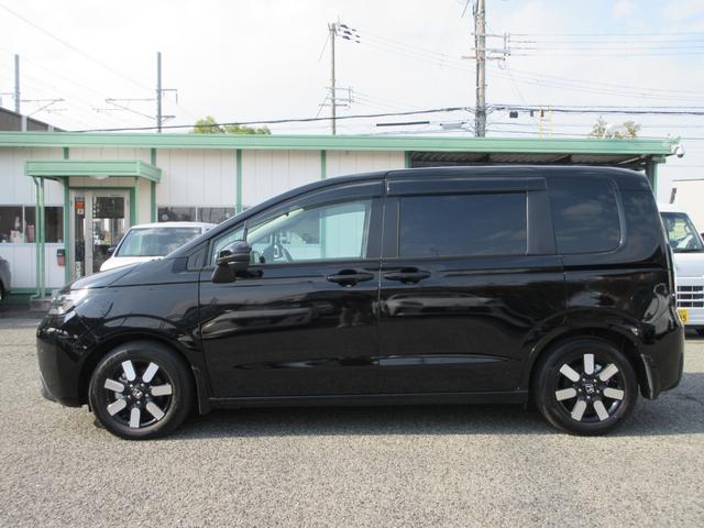 フリード ｅ：ＨＥＶエアー　ＥＸ　純正８型Ｄオーディオ（ＢＴ・ＵＳＢ）ホンダセンシング・両側パワスラ・禁煙車・ＥＴＣ・前席シートヒーター・後席ＵＳＢ端子・オートホールド・リアサンシェード・ブラインドスポットモニター（5枚目）