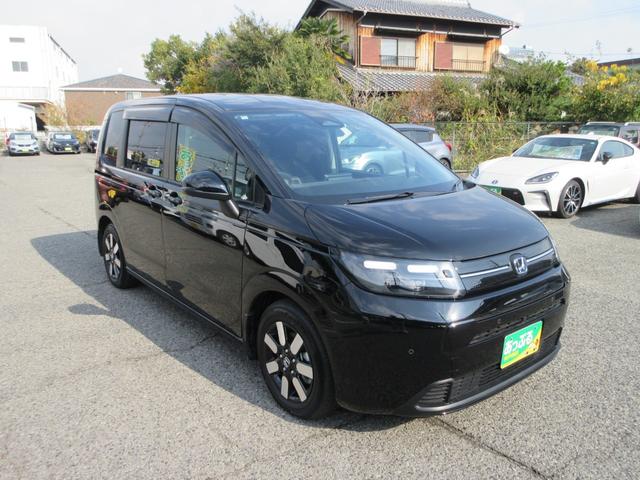フリード ｅ：ＨＥＶエアー　ＥＸ　純正８型Ｄオーディオ（ＢＴ・ＵＳＢ）ホンダセンシング・両側パワスラ・禁煙車・ＥＴＣ・前席シートヒーター・後席ＵＳＢ端子・オートホールド・リアサンシェード・ブラインドスポットモニター（6枚目）