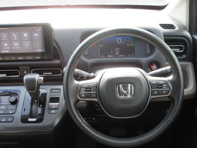 フリード ｅ：ＨＥＶエアー　ＥＸ　純正８型Ｄオーディオ（ＢＴ・ＵＳＢ）ホンダセンシング・両側パワスラ・禁煙車・ＥＴＣ・前席シートヒーター・後席ＵＳＢ端子・オートホールド・リアサンシェード・ブラインドスポットモニター（16枚目）