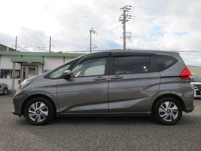 フリードハイブリッド ハイブリッド・Gホンダセンシング ナビ(CD・DVD・SD・BT・REC・フルセグ・USB)両側パワスラ・前後ドラレコ・禁煙車・ETC・Bカメラ・前席シートヒーター・オートワイパー・ホンダセンシング・リアサンシェード・USB(5枚目)