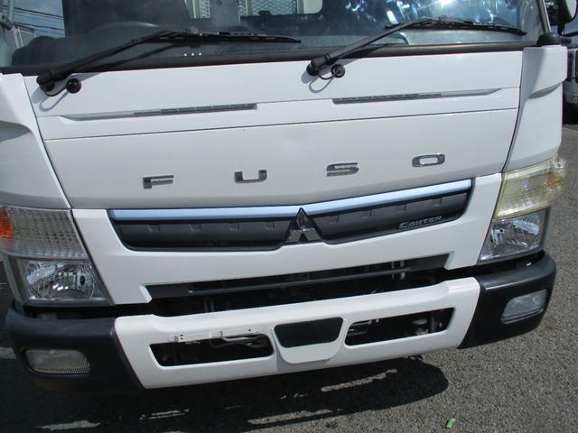 キャンター ４トン　増トン　ワイド超ロング　荷寸４９９－１９８－３７　全低床　６速ＡＴ　鳥居鉄板　ＥＴＣ　ＡＢＳ　ルーフキャリア　坂道発進補助装置　左電格ミラー　ラクラク君　作業灯　２トンベース　ターボ　１７５馬力　オーバーヘッドコンソール　中古車　中古トラック　平車（6枚目）