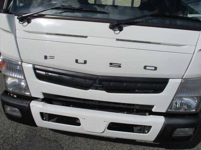 キャンター 2トン ワイド超ロング 全低床 5速MT 鳥居鉄板 荷台塗装 荷寸500-191-38 床板後ろ鉄板 ETC ロープ穴左右3ヶ所ずつ リアアオリ内側鉄板 左電格ミラー 150馬力 ABS ロープフック ターボ 取扱説明書 WL Wロング 2トン車 架装(6枚目)