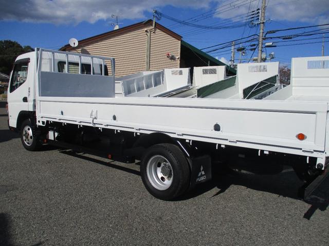 キャンター 2トン ワイド超ロング 全低床 5速MT 鳥居鉄板 荷台塗装 荷寸500-191-38 床板後ろ鉄板 ETC ロープ穴左右3ヶ所ずつ リアアオリ内側鉄板 左電格ミラー 150馬力 ABS ロープフック ターボ 取扱説明書 WL Wロング 2トン車 架装(10枚目)