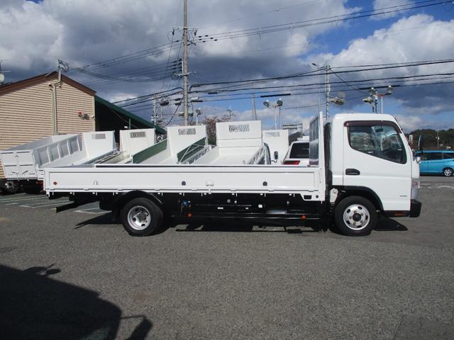 キャンター 2トン ワイド超ロング 全低床 5速MT 鳥居鉄板 荷台塗装 荷寸500-191-38 床板後ろ鉄板 ETC ロープ穴左右3ヶ所ずつ リアアオリ内側鉄板 左電格ミラー 150馬力 ABS ロープフック ターボ 取扱説明書 WL Wロング 2トン車 架装(13枚目)